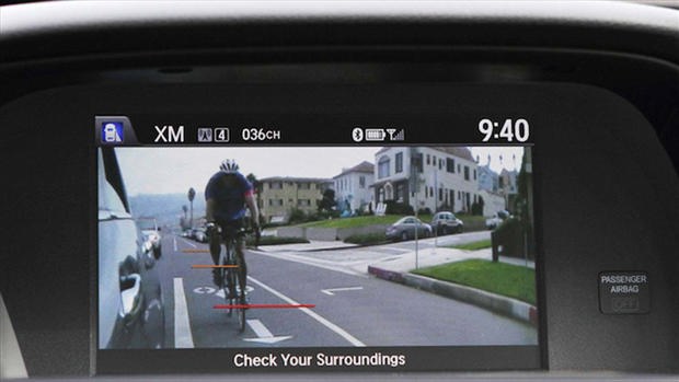 BLIS was a camera-based setup that evolved into a radar-based system with sensors mounted behind rear quarter panels. Camera-based systems are back, however, with Honda's LaneWatch using a camera in the right-hand mirror housing to broadcast an image to the display screen in the dash.
