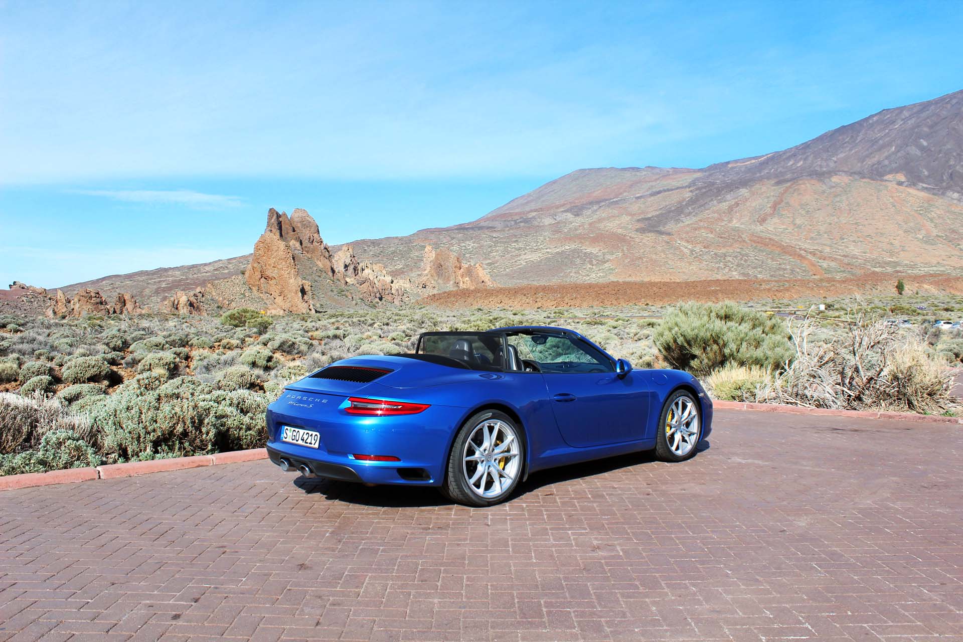 The 2017 Porsche 911 Carrera Cabriolet starts at $116,200. This is a Carrera S Cabriolet – base price $132,200. That volcano last erupted in 1798. If it happens again, the 911’s roof goes up in less than 20 seconds.