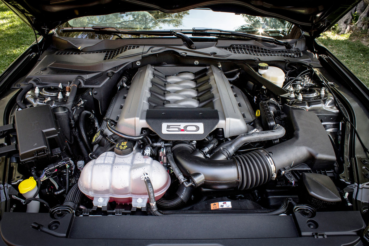 Of course, you can't have a Mustang without a V8 option. This year, the 5.0L “Coyote” engine makes a solid 435 hp and 400 lb-ft of torque – stupendous numbers. It's quieter than expected, although again, we're talking about a fan-base here that loves to bolt on aftermarket exhausts. Combined with the performance package, the 5.0L option transforms the Mustang into a real backroads hero, one of the most fun cars of any kind on the road today. 